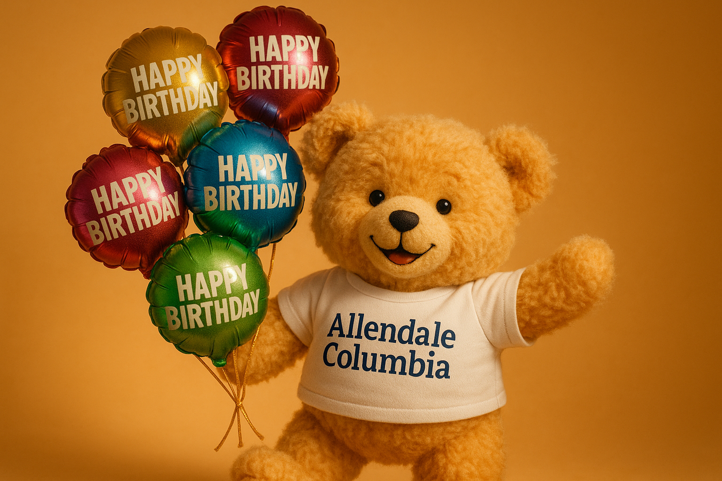 Teddy Bear wearing white allendale columbia tshirt holding foil happy birthday balloons